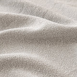 Macro of the fine soft-touch texture of the silver grey sofa cover