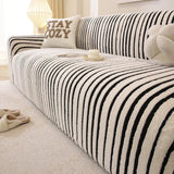 Macro of the plush midnight black and ivory striped sofa cover fabric texture