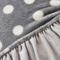 Detail of the elastic gathered hem on the grey snow teddy sofa cover underside