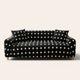 Midnight dot teddy sofa cover with cream polka dots on a three-seat sofa, front view on ivory backdrop