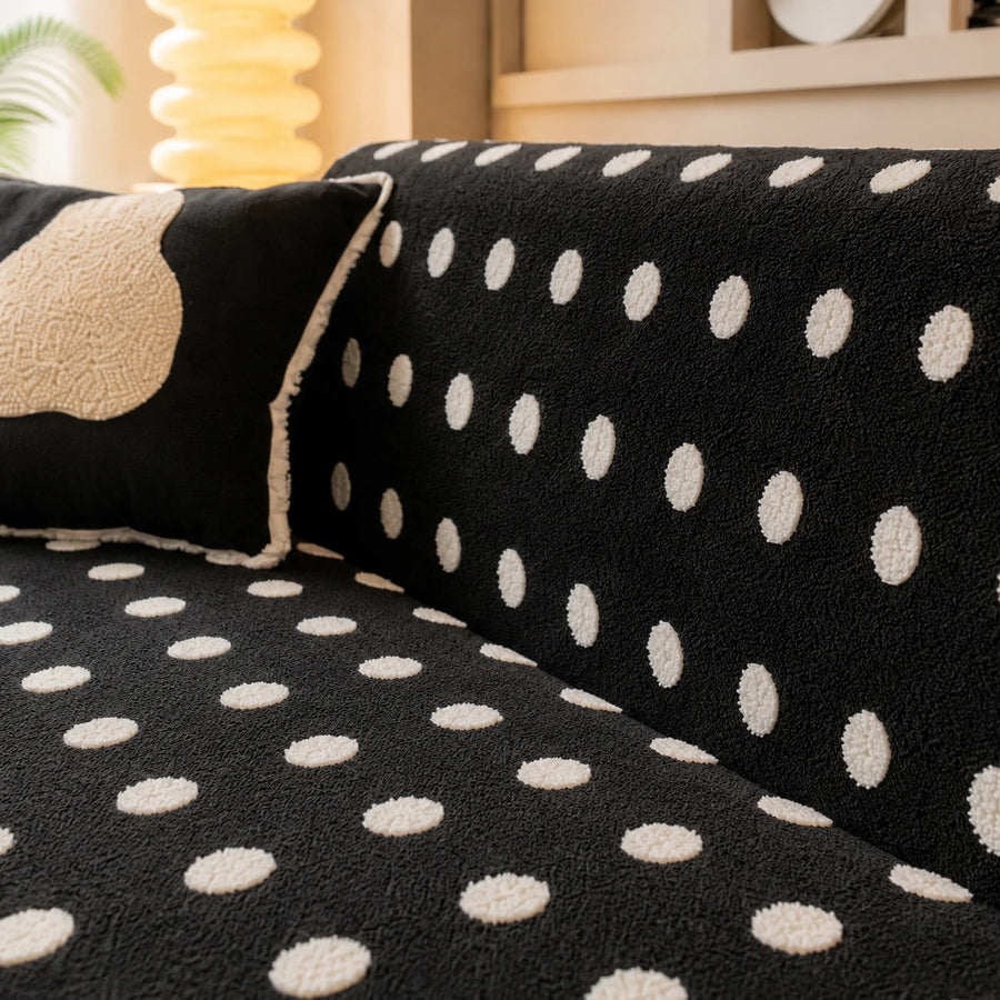 Close view of the midnight dot teddy sofa cover backrest and raised cream dots