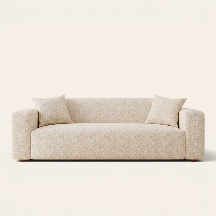 Sand gold teddy sofa cover fitted on a three-seat sofa, front view on ivory backdrop
