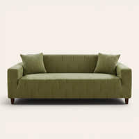 Sage green velvet sofa cover fitted on a three-seat sofa, front view on ivory backdrop