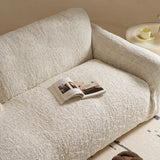 Close view of the ivory cream woven sofa cover texture across the seat and backrest