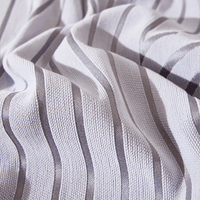 Macro of Misty Gray Arcane Ambiance fabric, fine gray woven stripes scrunched