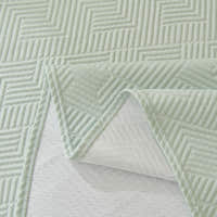 Mint Veil Artisan Cooling throw corner folded back to reveal the mesh underside and quilted top
