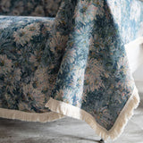 Close-up of the tapestry weave and fringed border of the Blue Bouquet floral throw