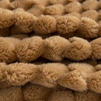 Macro of the plush Honeycomb Beige fabric showing the Cozy Chic textured bubble weave