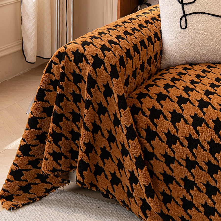 Close view of Coffee Brown Cozy Houndstooth throw draped over the sofa arm showing plush houndstooth texture