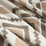 Close-up of the woven fabric folds of the Geometric Boho throw in Beige Geometry