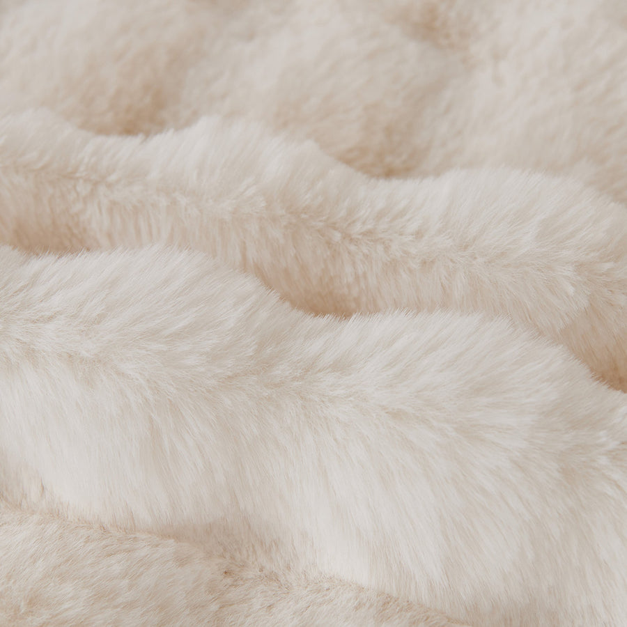 Close-up of the rippled Ivory Luxe faux fur showing the Luxe Ripple plush texture
