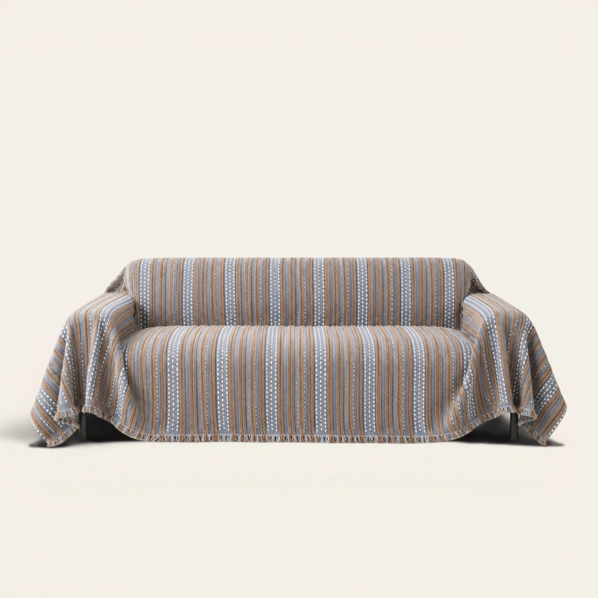 Slate Blue Metro Stripe sofa throw draped over a full couch, front view on ivory background
