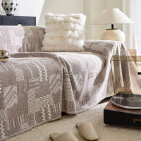 Latte Beige Modern Washed throw over a sofa in a cozy room with a record player and slippers