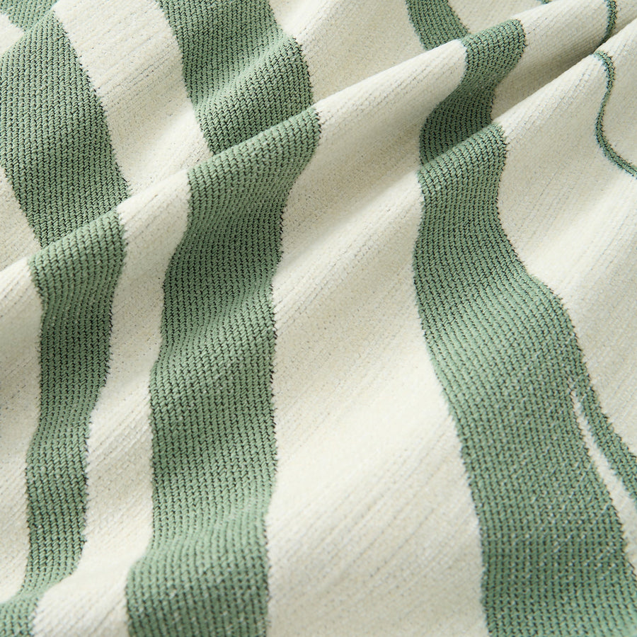 Macro of the Verdant Flow Modern Wave fabric showing sage green and cream woven stripes