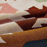 Macro of the woven Ivory Blooms fabric showing the Sunflowers Fantasy sunburst motifs